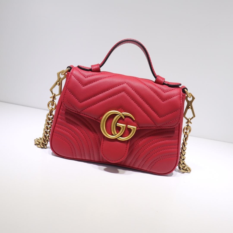 G*u*i top handle bags